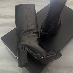 CHANEL Black Leather Knee Boots with Chain Trim